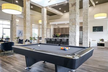 social lounge with billiards at The Allure apartments